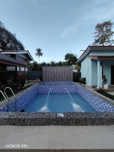 Πισίνα στο ή κοντά στο Homestay Teratak D'Desa