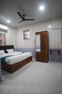 Ένα ή περισσότερα κρεβάτια σε δωμάτιο στο Nexus Corporate Stay