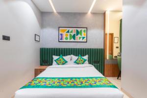 Postel nebo postele na pokoji v ubytování Treebo SV Residency, Vellore + 37 fotografií