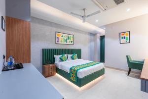 Ένα ή περισσότερα κρεβάτια σε δωμάτιο στο Treebo SV Residency, Vellore