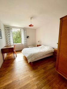 Postel nebo postele na pokoji v ubytování Grande Maison à la Campagne