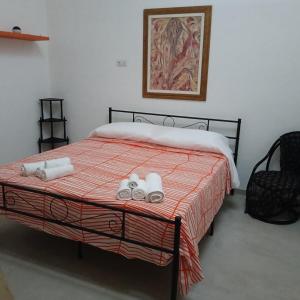 Ένα ή περισσότερα κρεβάτια σε δωμάτιο στο Home holiday Tutino +26 φωτογραφίες