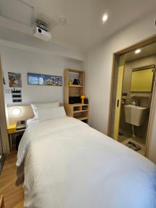 Hotel Marguerite Seoul房間的床
