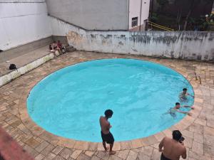 Kolam renang di atau dekat dengan Apartamento Jardim das flores