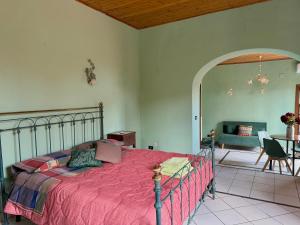 Ένα ή περισσότερα κρεβάτια σε δωμάτιο στο Le Terrazze