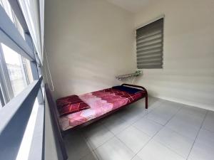 Postel nebo postele na pokoji v ubytování Mama Zan Homestay + 8 fotografií