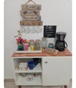 a table with a counter with food on it at Apto na Siqueira Campos, centro in Santarém