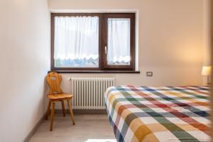 Ένα ή περισσότερα κρεβάτια σε δωμάτιο στο Trilo Fiéma +22 φωτογραφίες