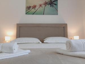 Posteľ alebo postele v izbe v ubytovaní Apartments Villa Odesa with shared pool