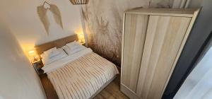 Posteľ alebo postele v izbe v ubytovaní Apartament Boho