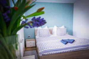 Postel nebo postele na pokoji v ubytování Apartments Relax