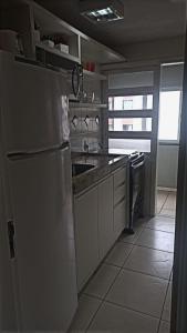 Η κουζίνα ή μικρή κουζίνα στο Apartamento com vista pro mar