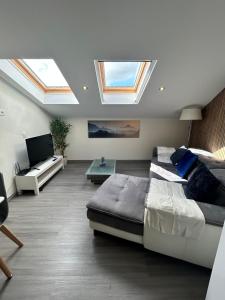 TV a/nebo společenská místnost v ubytování Fernandes Holidays