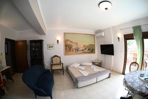 Voodi või voodid majutusasutuse OLD ZAKYNTHOS GALLERY GIO 2 toas