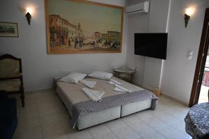 Voodi või voodid majutusasutuse OLD ZAKYNTHOS GALLERY GIO 2 toas