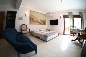Voodi või voodid majutusasutuse OLD ZAKYNTHOS GALLERY GIO 2 toas