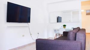 TV a/nebo společenská místnost v ubytování Boulevard Park IV 106