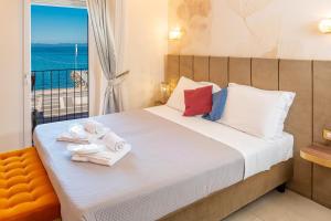 Ένα ή περισσότερα κρεβάτια σε δωμάτιο στο I Tre Re Rooms