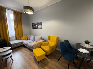 Posezení v ubytování Tabago Studio 32 Brzeg Wolności
