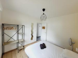 Posteľ alebo postele v izbe v ubytovaní Grande maison familiale avec piscine, proche plage