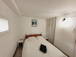 Posteľ alebo postele v izbe v ubytovaní Grande maison familiale avec piscine, proche plage