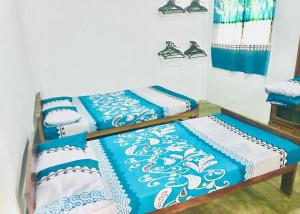 Postel nebo postele na pokoji v ubytování Chavo Gest House