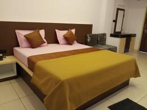 Posteľ alebo postele v izbe v ubytovaní Hotel goldy premium