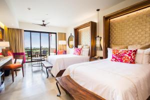 Cama o camas de una habitación en Secrets Akumal Riviera Maya - Adults Only