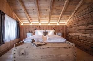 Ένα ή περισσότερα κρεβάτια σε δωμάτιο στο Ciasa Somuer +13 φωτογραφίες