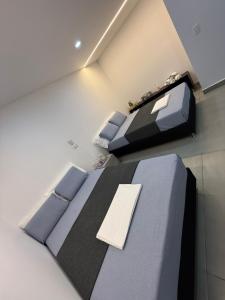 Postel nebo postele na pokoji v ubytování Nova estudio