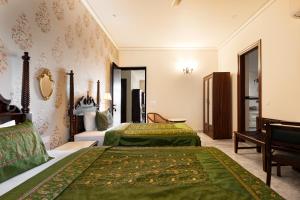 Dera Jaipur Homestay客房内的一张或多张床位