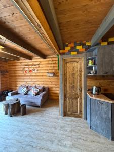 a living room with a couch and a table at Arte Jermuk #2 in Jermuk