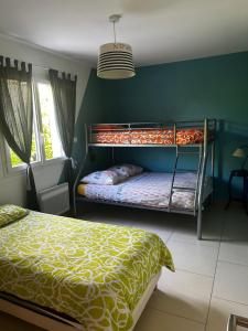 En eller flere senge i et værelse på Gites de la Casasole + 28 billeder