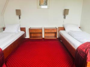 Postel nebo postele na pokoji v ubytování Hotel Amadeus
