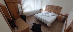 Postel nebo postele na pokoji v ubytování Guest House Planinski Zdravets