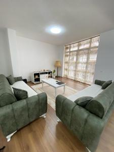Ruang duduk di A&A Apartments Prizren +24 gambar
