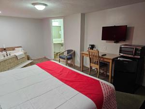 Postel nebo postele na pokoji v ubytování OYO Hotel Starlite Seneca Falls