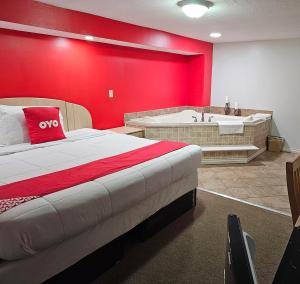 Postel nebo postele na pokoji v ubytování OYO Hotel Starlite Seneca Falls