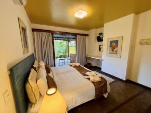 Katil atau katil-katil dalam bilik di Hotel Pousada Pitinga