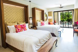 Cama o camas de una habitación en Secrets Akumal Riviera Maya - Adults Only