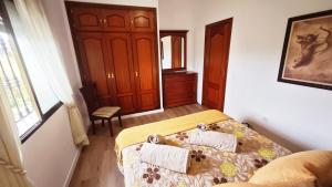 Posteľ alebo postele v izbe v ubytovaní Villa Aljara