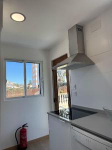 Kuchyň nebo kuchyňský kout v ubytování Villa BRISAETA