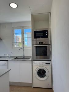 Kuchyň nebo kuchyňský kout v ubytování Villa BRISAETA