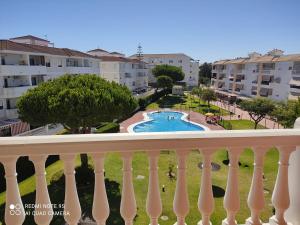 Πισίνα στο ή κοντά στο Bonito piso con piscina y pádel
