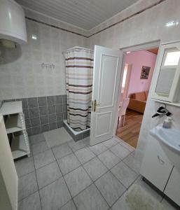 Koupelna v ubytování Bangó Vendégház + 37 fotografií