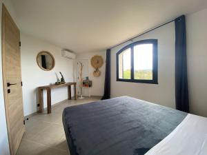 Кровать или кровати в номере MarinesAppartement, Beach Duplex