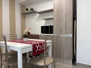 Et tv og/eller underholdning på Appartamento Lidia - vacanze al mare pieno centro - Premium Villas