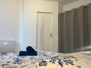 Posteľ alebo postele v izbe v ubytovaní Lourdes : Superbe T2 42m2