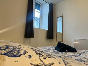 Posteľ alebo postele v izbe v ubytovaní Lourdes : Superbe T2 42m2