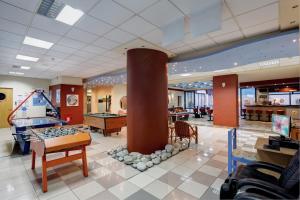 Televízia a/alebo spoločenská miestnosť v ubytovaní Agrabella Hotel - Adults Only